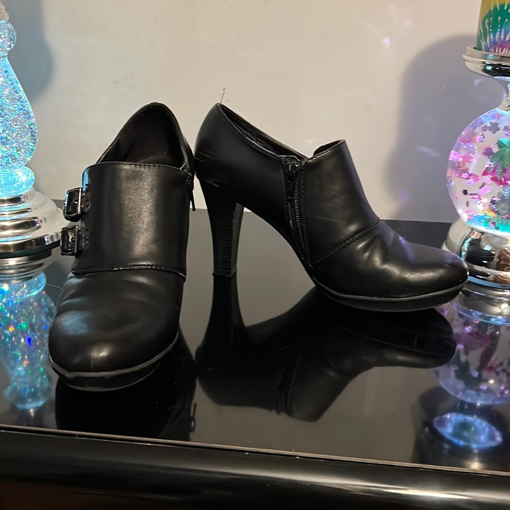 Black size 8 1/2 ankle booties with side buckles and a chunky heel